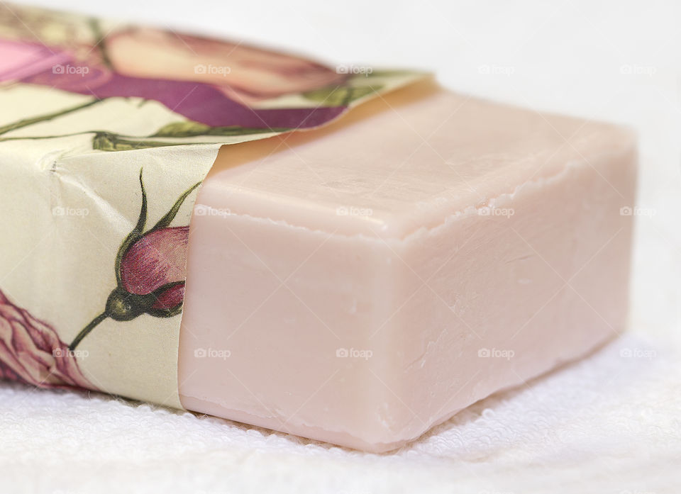 Pink soap in floral wrapper.