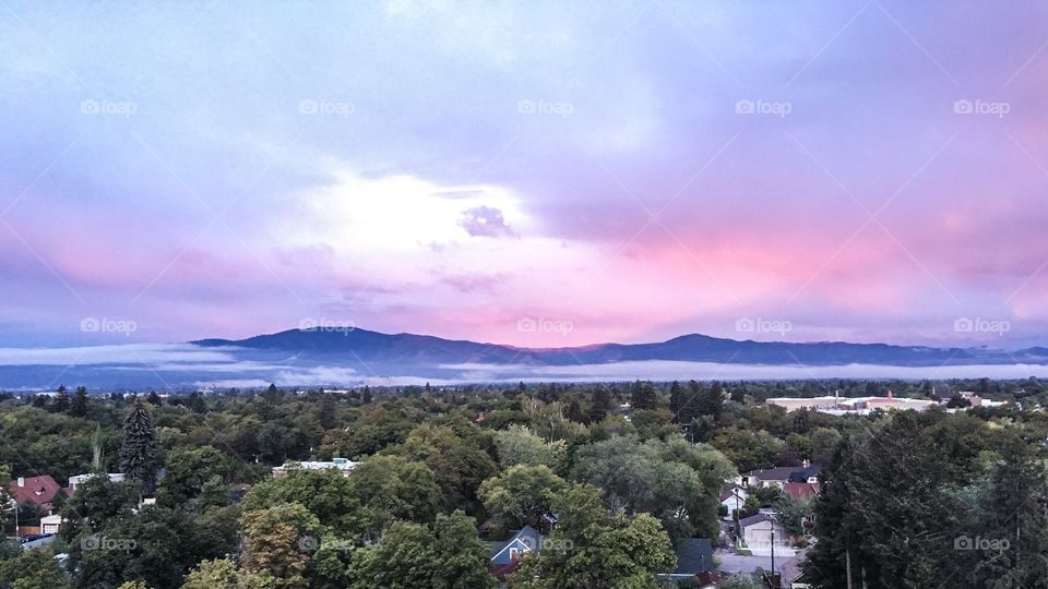 Colorful, foggy sunrise in Missoula, Montana. 