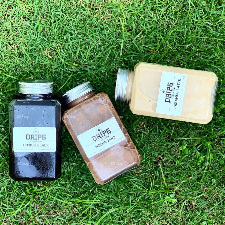 Cold brew in different flavours: black coffee, mocha and caramel latte 
