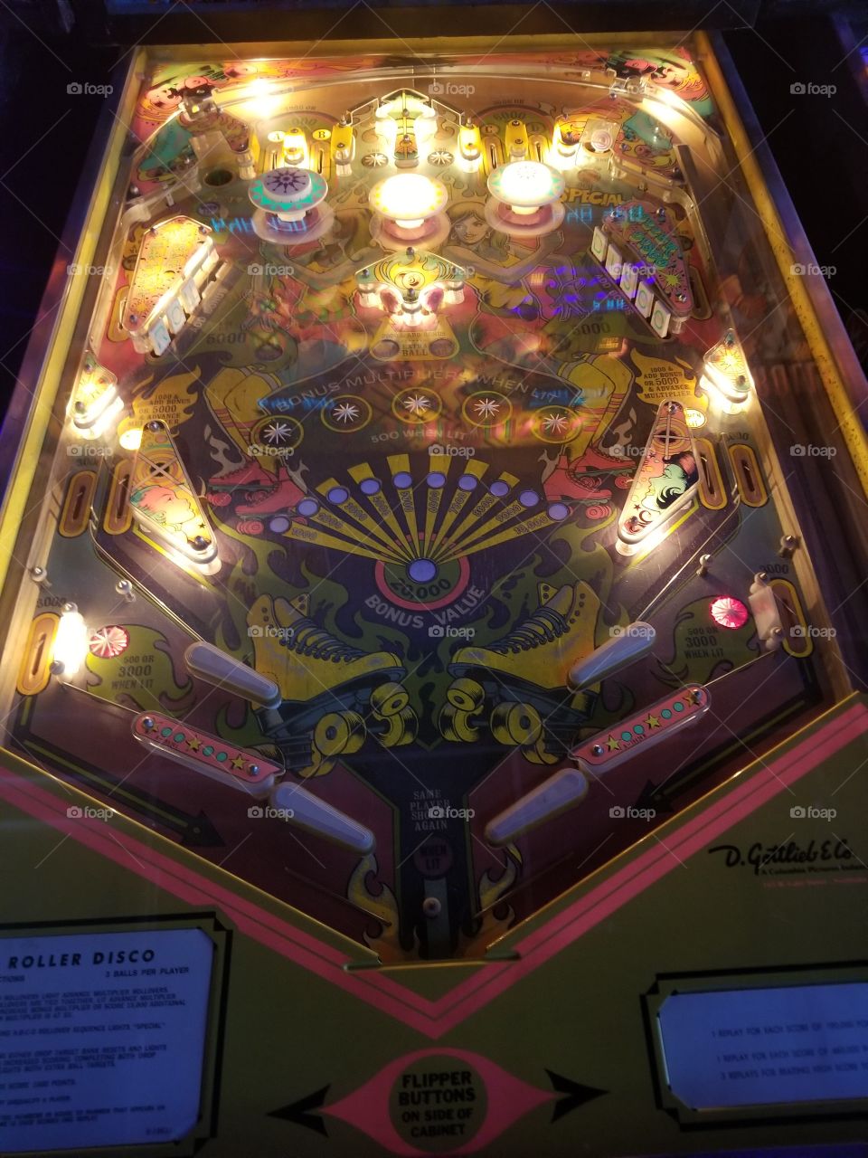 colorful pinball arcade game close up