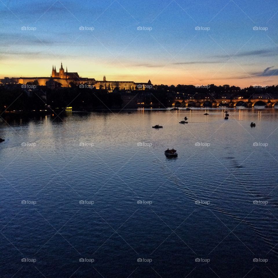 Gorgeous sunset in Prague, looking at the Prague Castle over the River Vltava