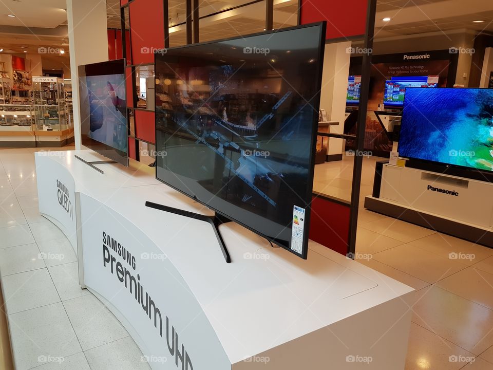 Samsung Premium UHD television with forked style stand