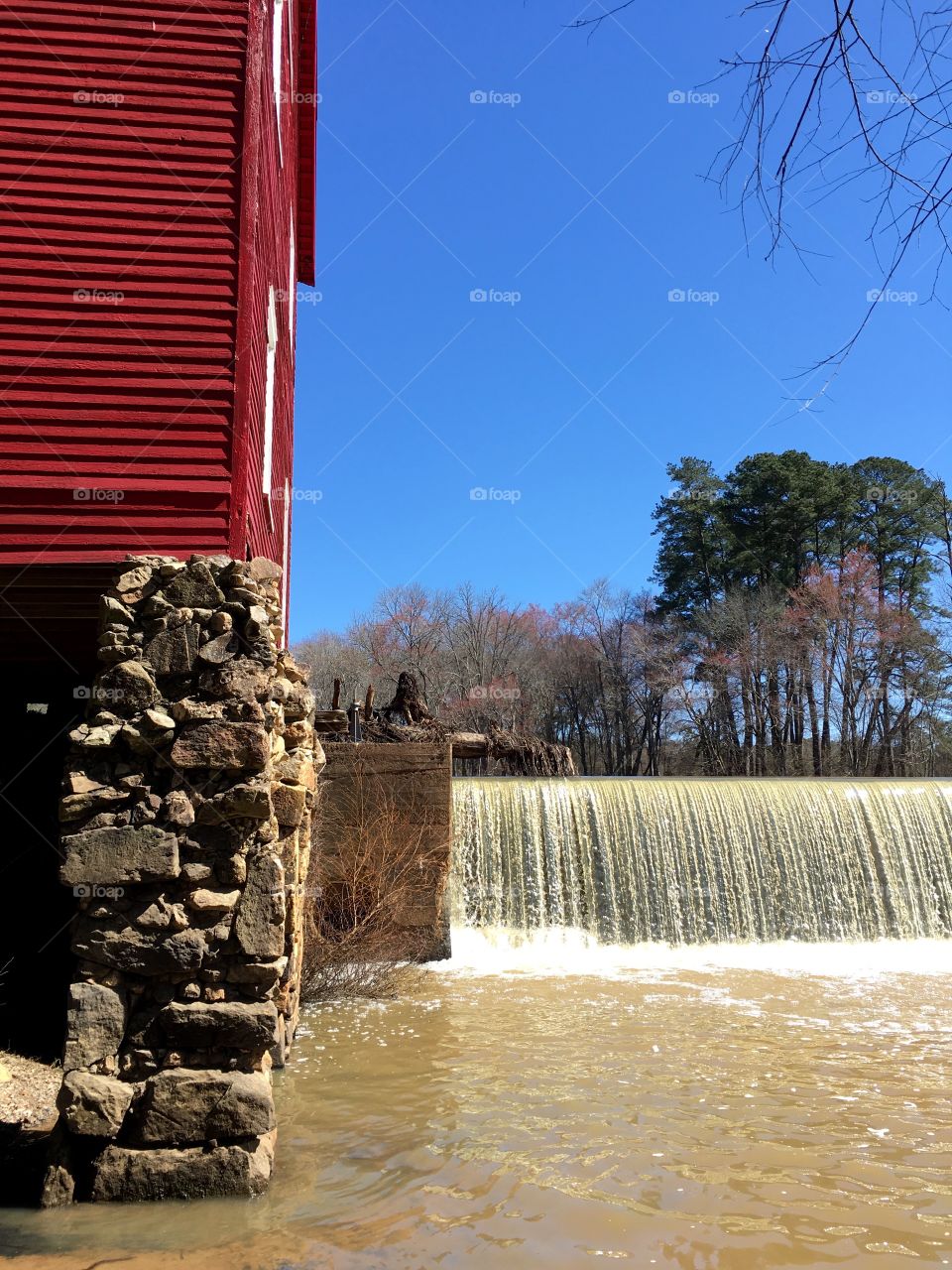 Red mill and waterfall