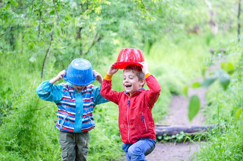 Small Moments of Happiness, Kids Playing under the Rain