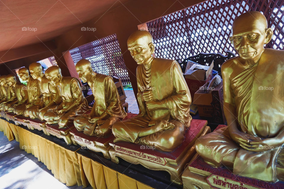 Gold monk statues, Thailand 