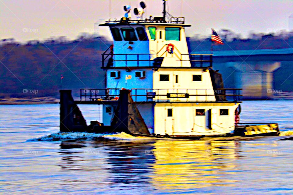 Riverboat on the Mississippi River. I used a slow shutter speed and tried to rotate my camera to make everything else blurrier. A challenge for sure. 