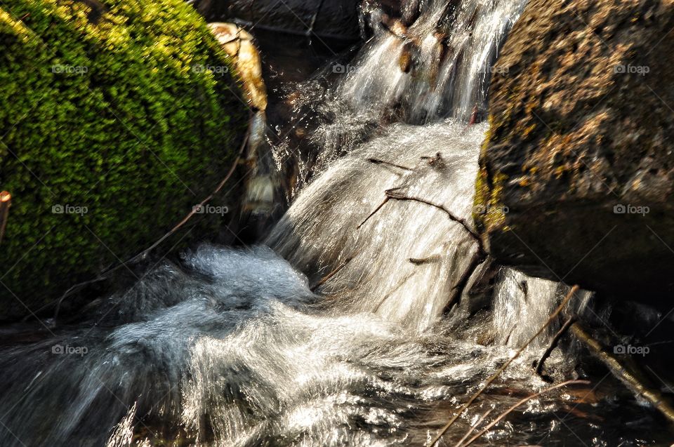 waterfall in the spring park in Poland