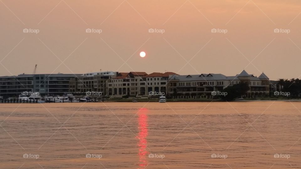 smoky sunset. smoke changed the sun to pink 