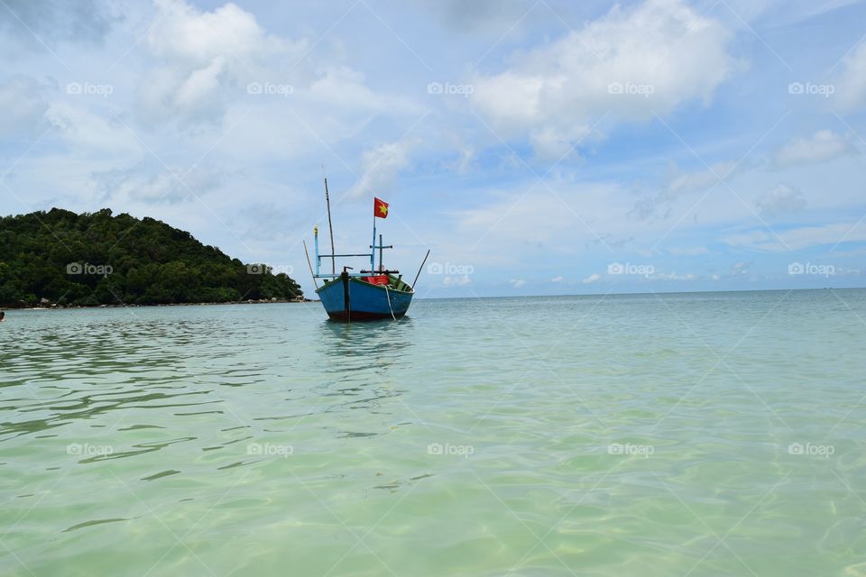 Boat in the paradise . A typical Asian boat at the most amazing beach of Vietnam. Picture taken on Phu Quoc Island. 