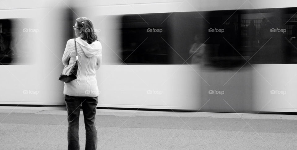 woman train waiting subway by latigreplata