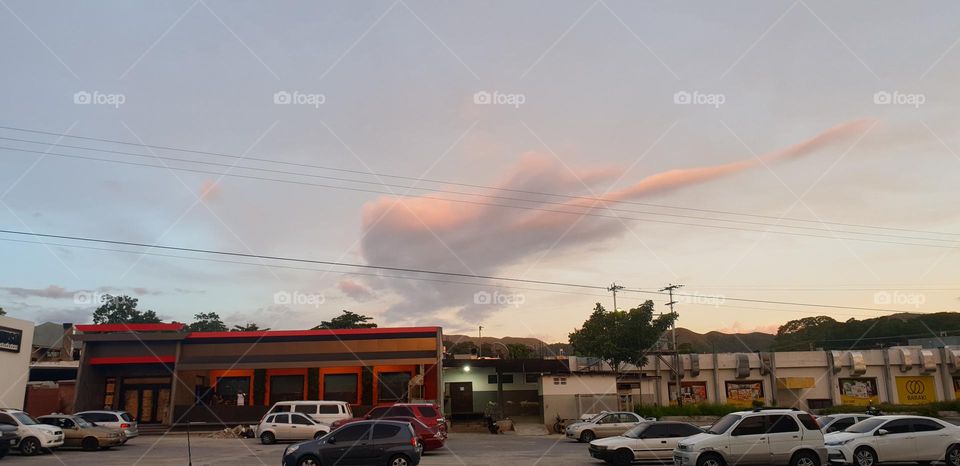 Big cloud in the shape of a guitar in the sky