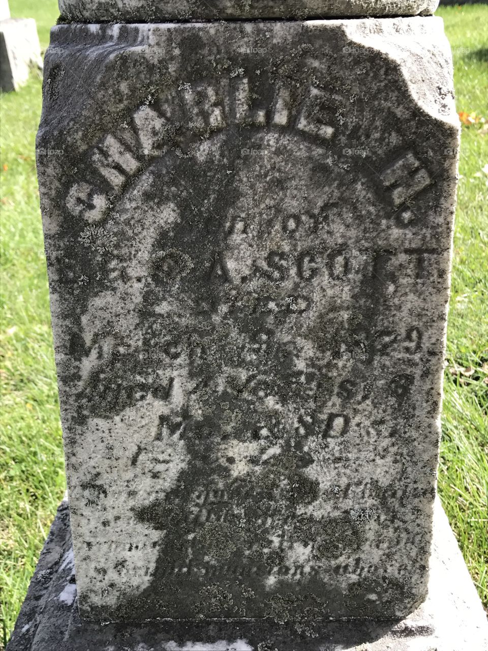 Old weathered and eroded tombstone
