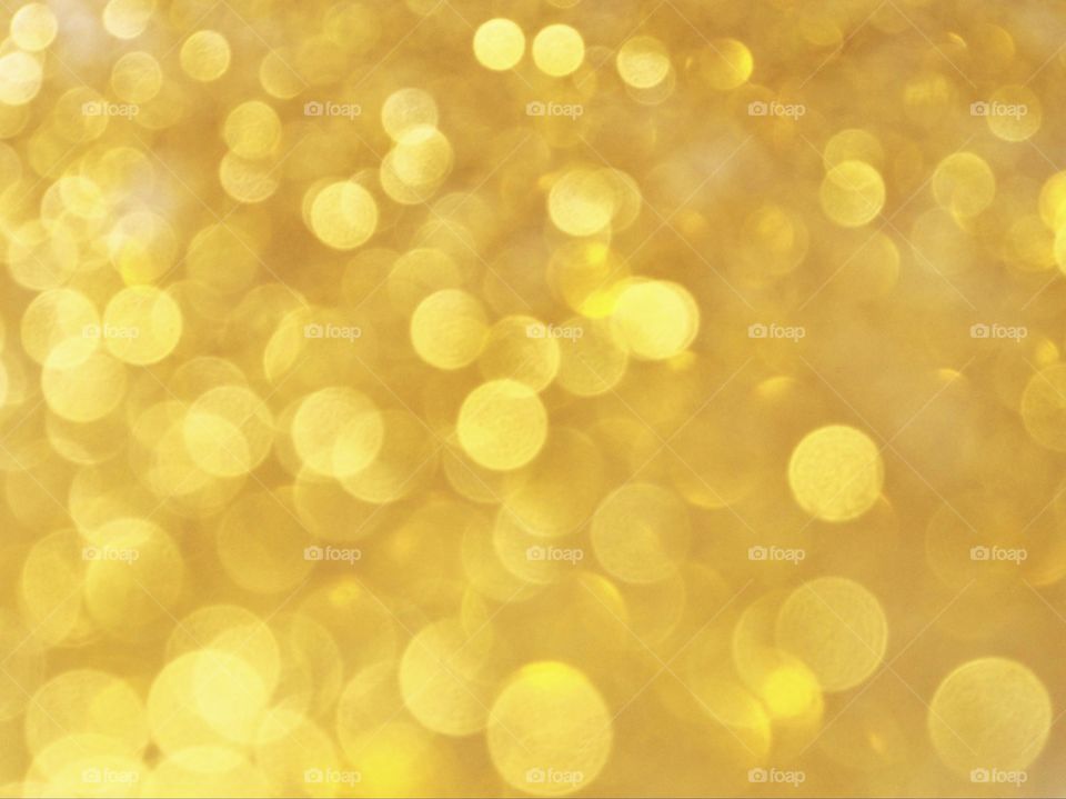 Background blurry bogeh gold glitter