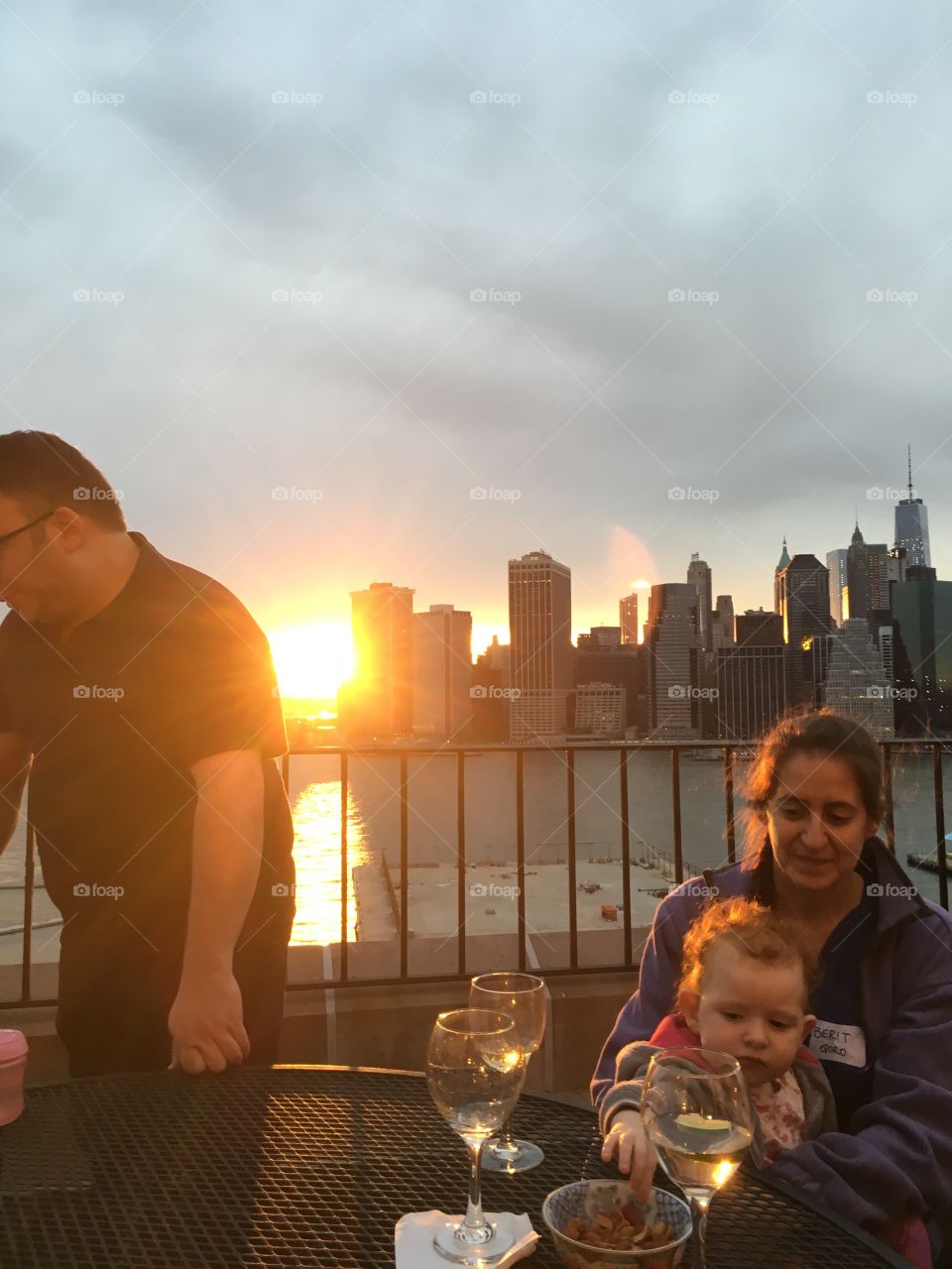 The sunset sends bright golden rays of light towards the balcony of the luxury home “in the sky” on Pierrepoint Place, Bklyn, NY we had the pleasure to be invited to attend for a dinner party and school reunion in September 2017. Hypnotic Productions