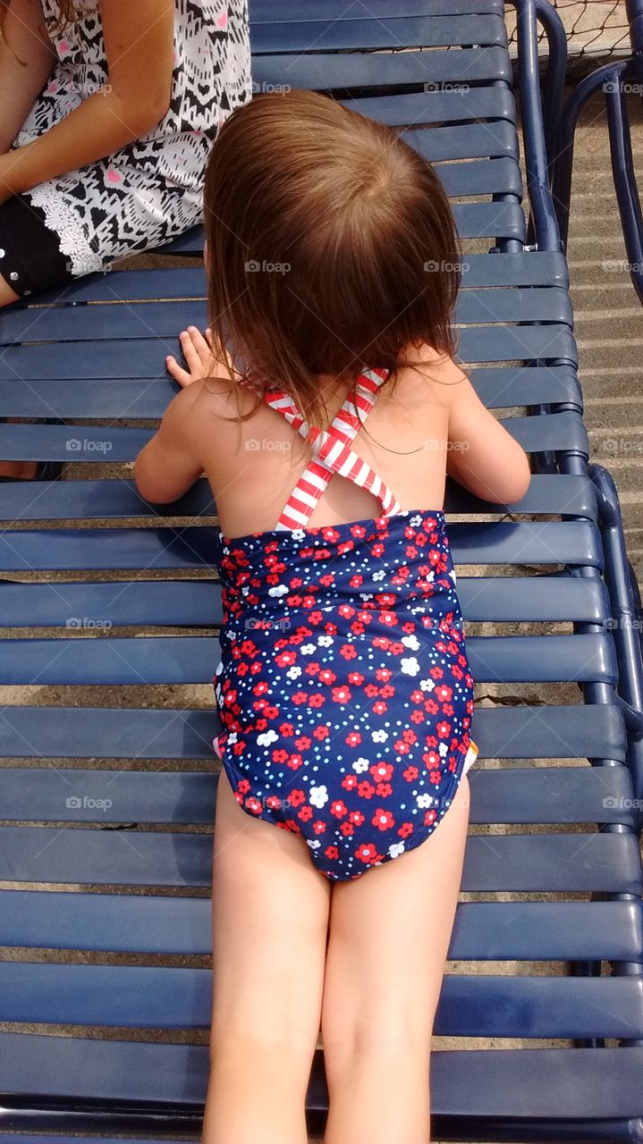 Toddler sun bathing
