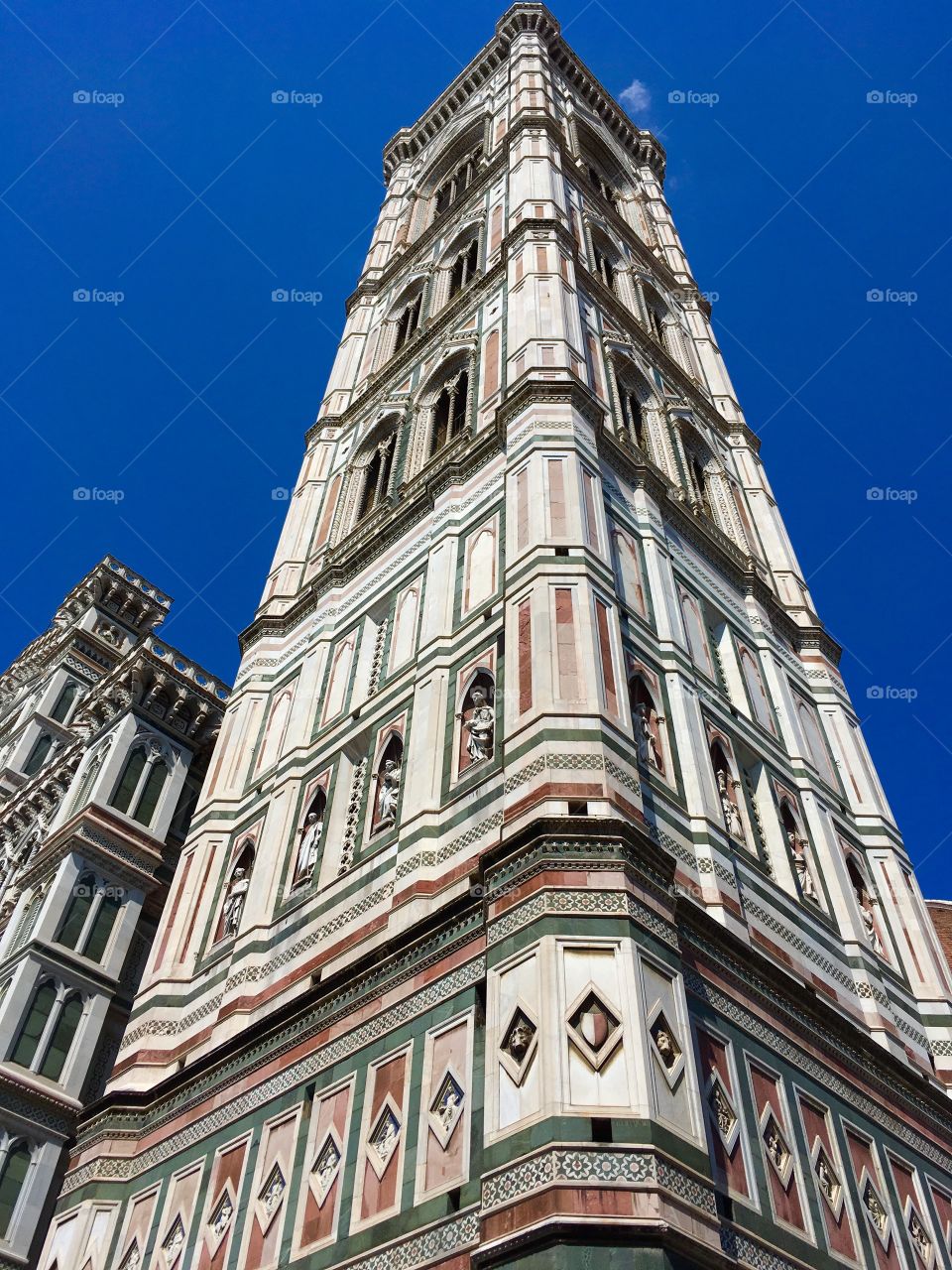 perspective view of the bell tower of Giotto with the cathedral of Santa Maria del Fiore, Florence