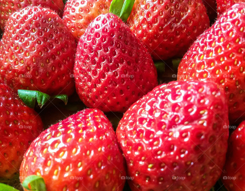 Full frame shot of red strawberries