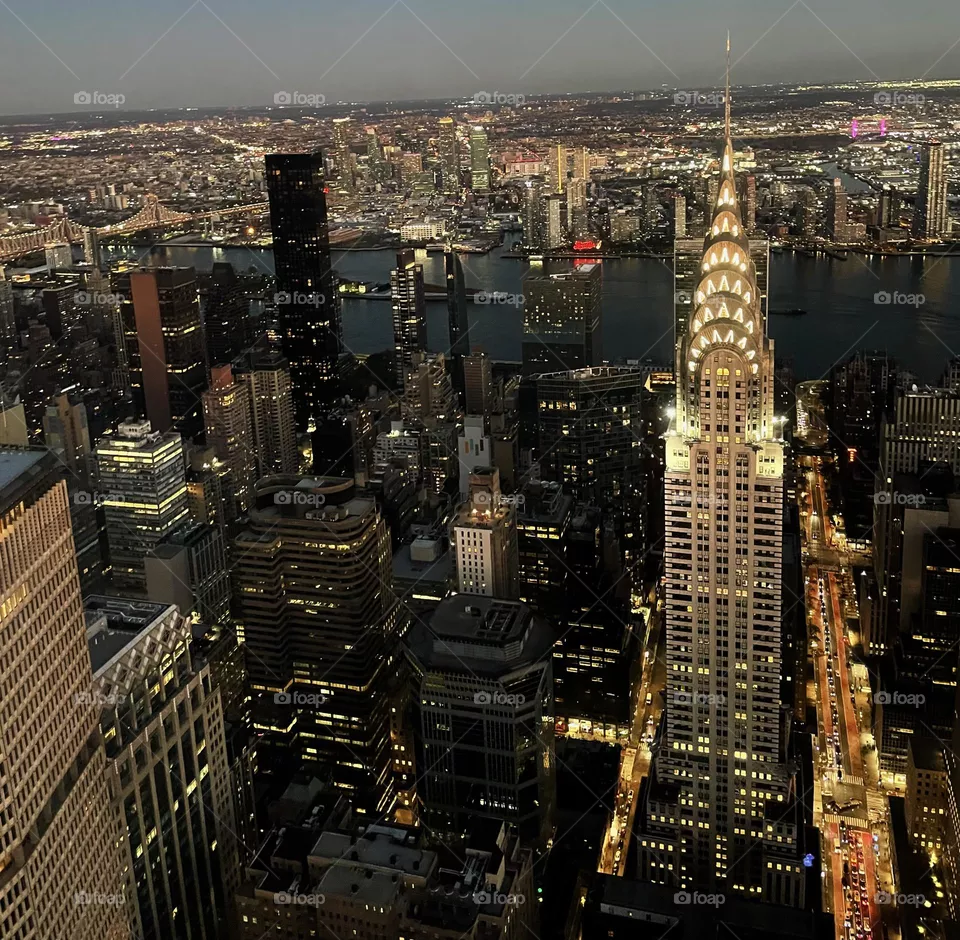 View from observatory deck of the Summit One Vanderbilt overlooking the Empire State Building in NYC