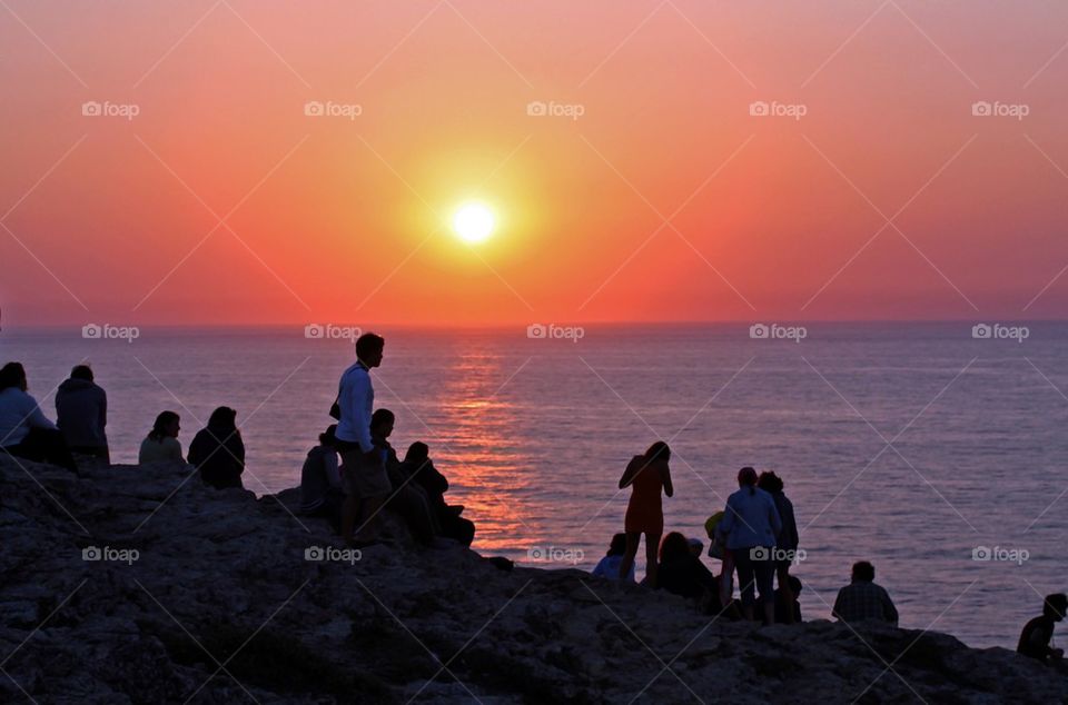 silhouettes backlit horizon coast by ozoomia