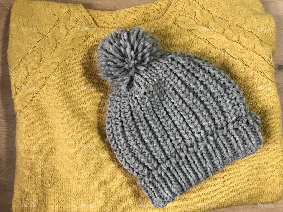 This soft, grey hat from wool will keep your head warm during the cold days of winter.