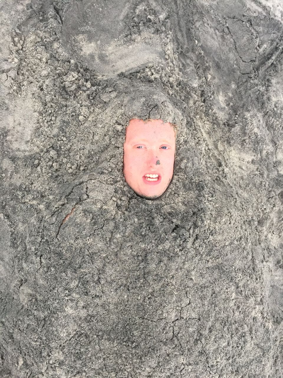 Buried in the beach sand!