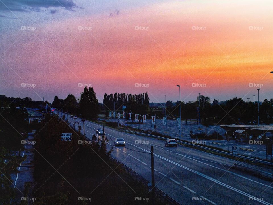 Highway traffic at sunset