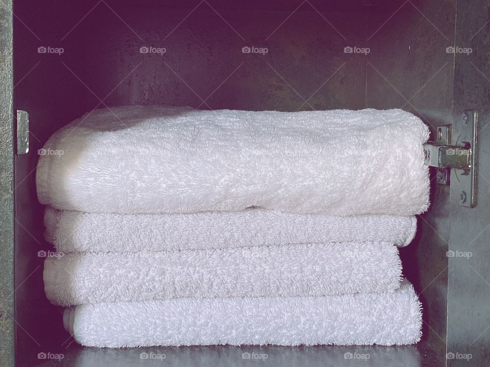 White towels are in the bathroom