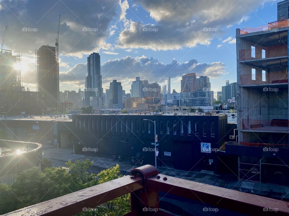 From the viewing outpost on top of the “Pulaski Bridge” at “Newtown Creek” we can see “Long Island City” and in the far distance “Manhattan” on a beautiful late afternoon in Mid June of 2023. Hypnotic Productions