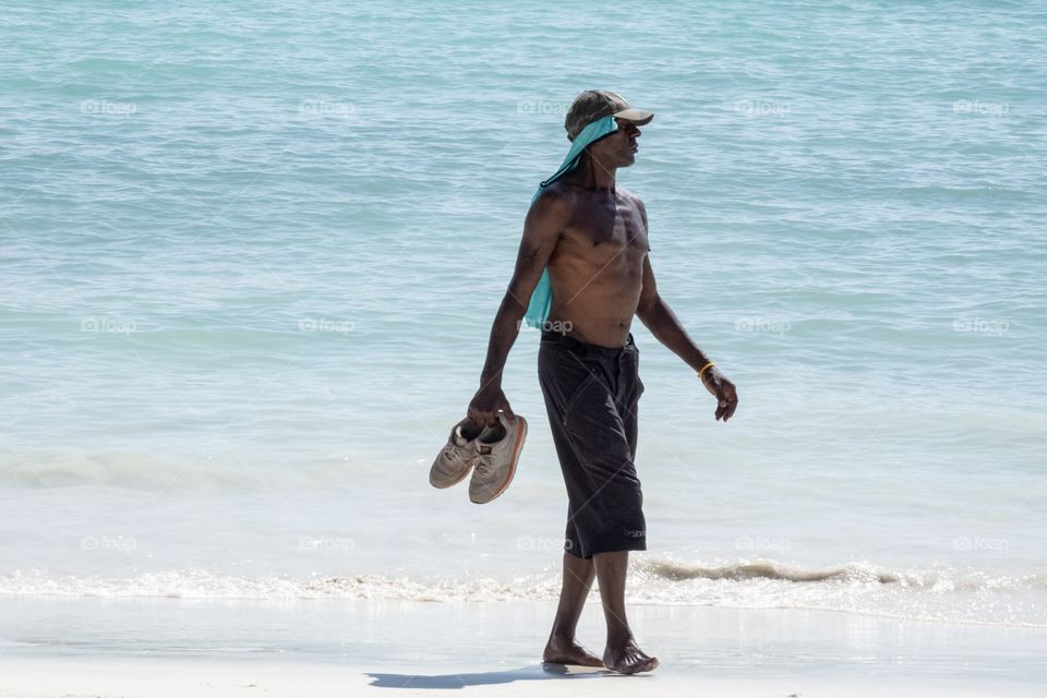 Man happy fun on the beautiful beach