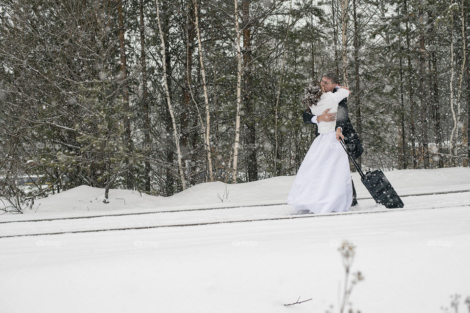 Couple kissing in winter