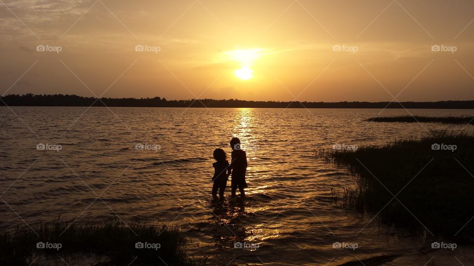 sunset. children in sunset