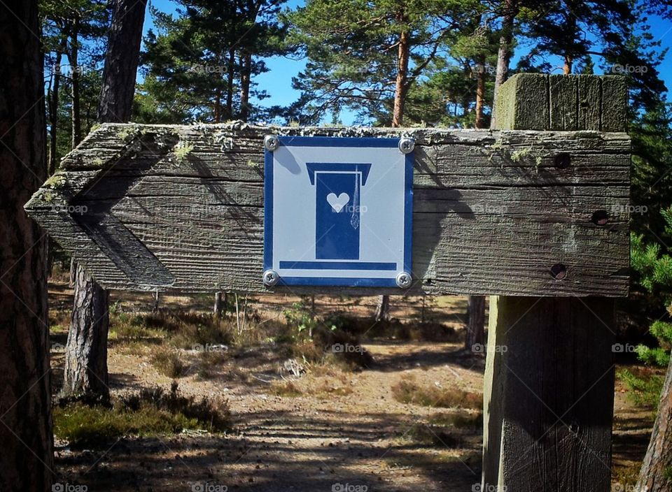 Outhouse sign
