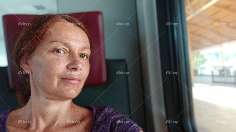 woman in public transport, transportation