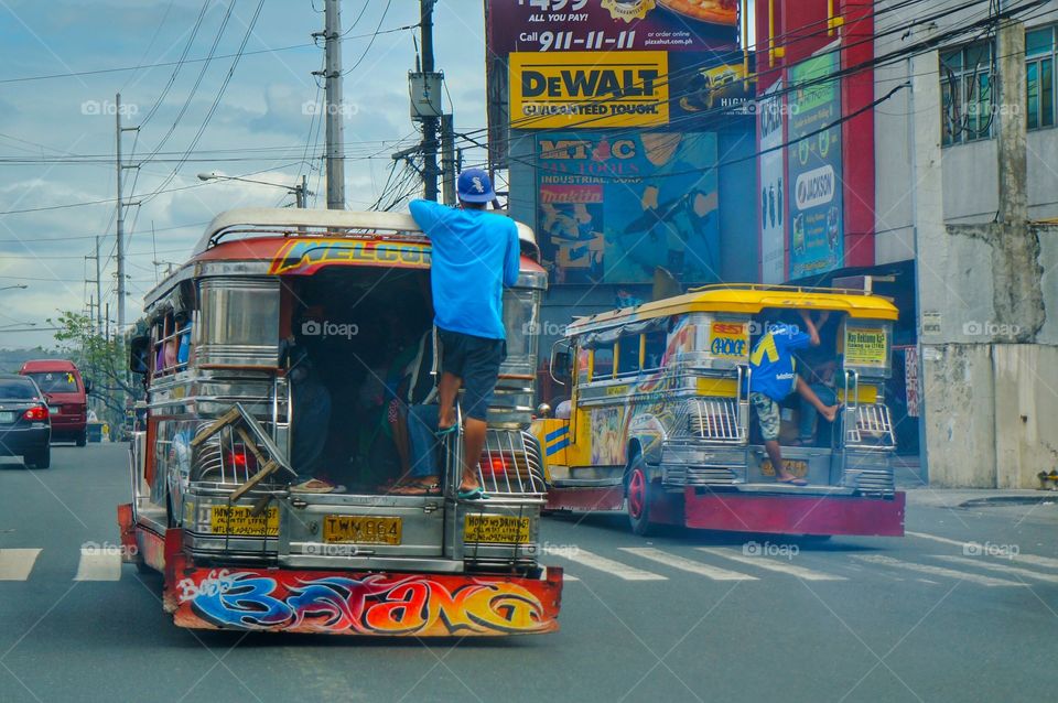 riding public jeepneys in Manila
