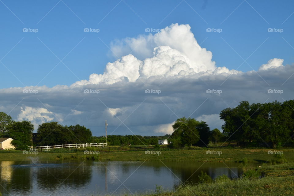 pond reflection. Beautiful sky and Texas countryside