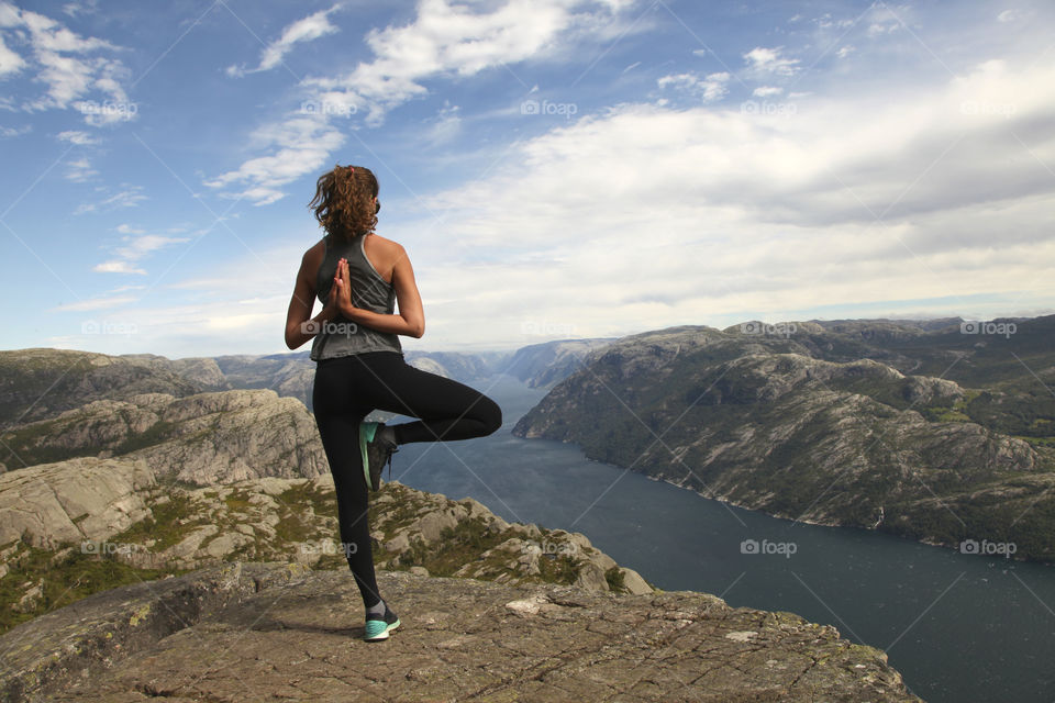 yoga pose on a mountain