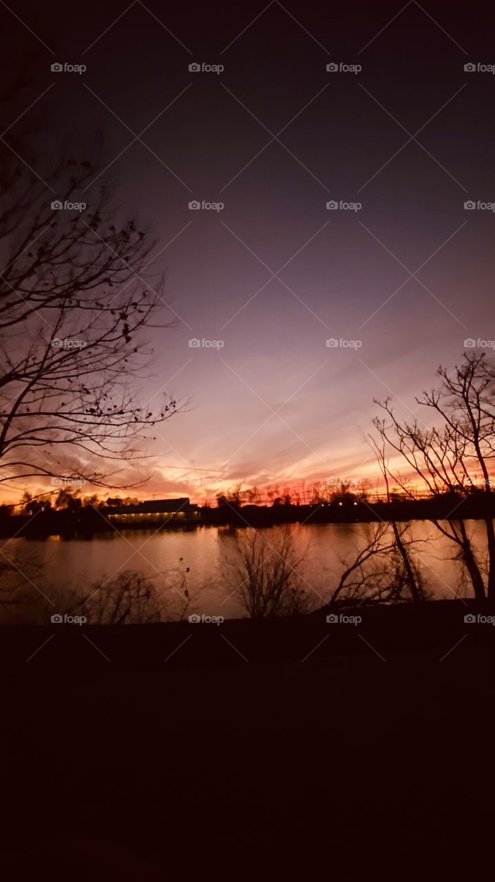 High Clouds adjusting the sky during Sunset. Colors radiating within all the feathering of clouds with wind patterns. More Vivid Colors showing the Twilight fade of Sunset.