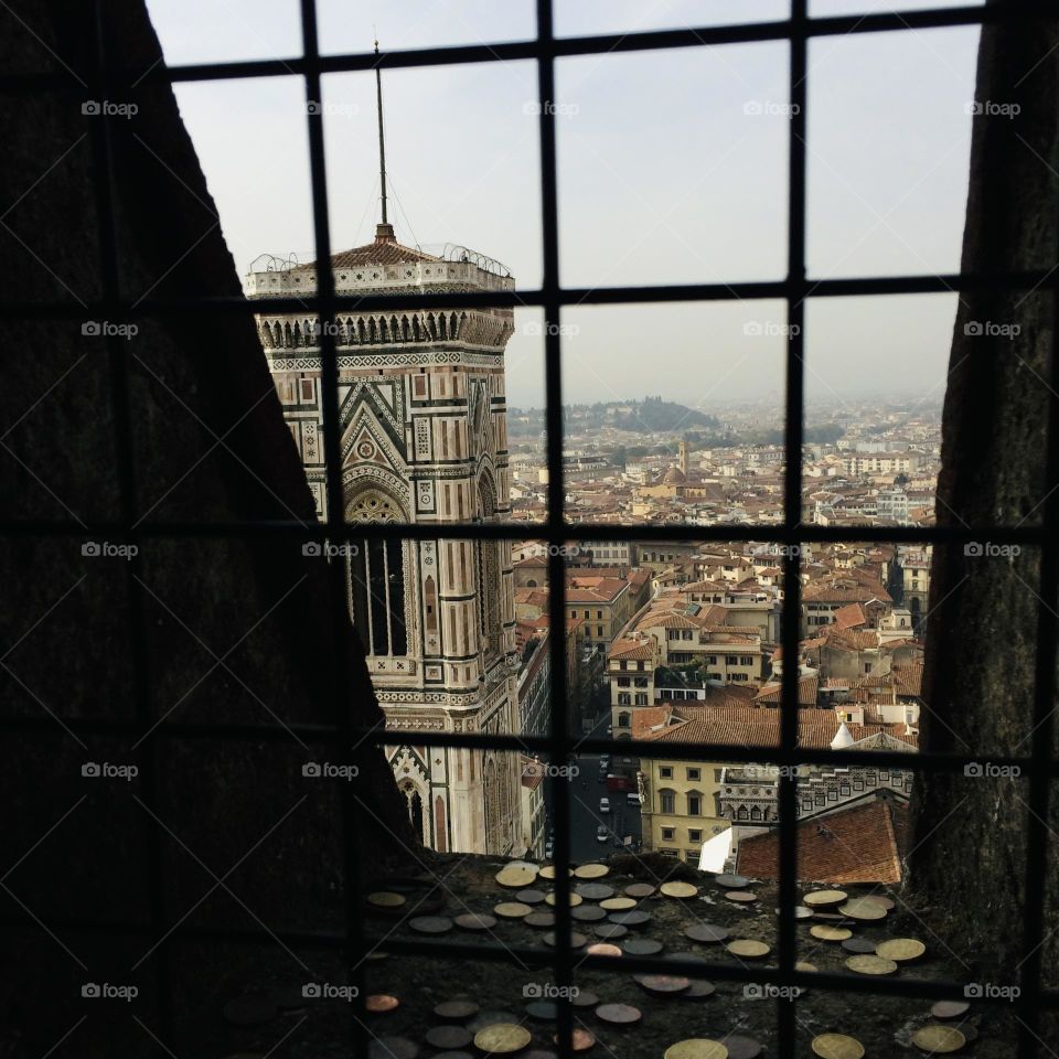 Coins left for luck out a tower window