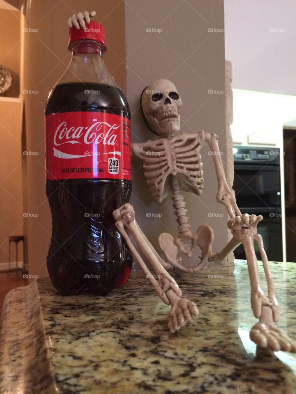 Skeleton and Coca-Cola on the counter