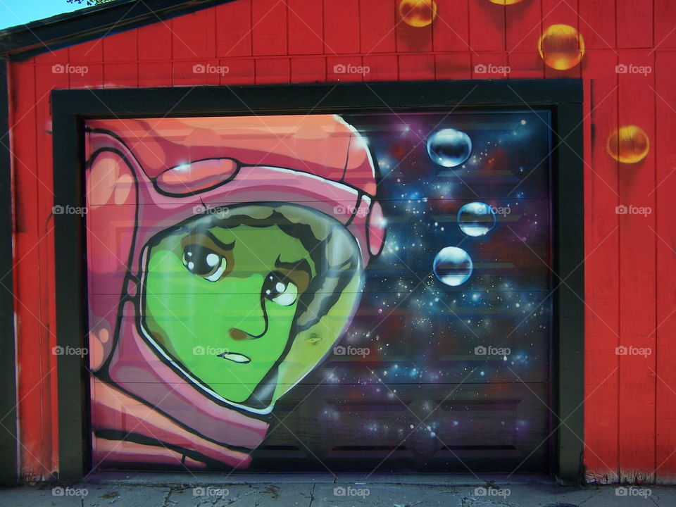 Spaceman. Driving through the alley