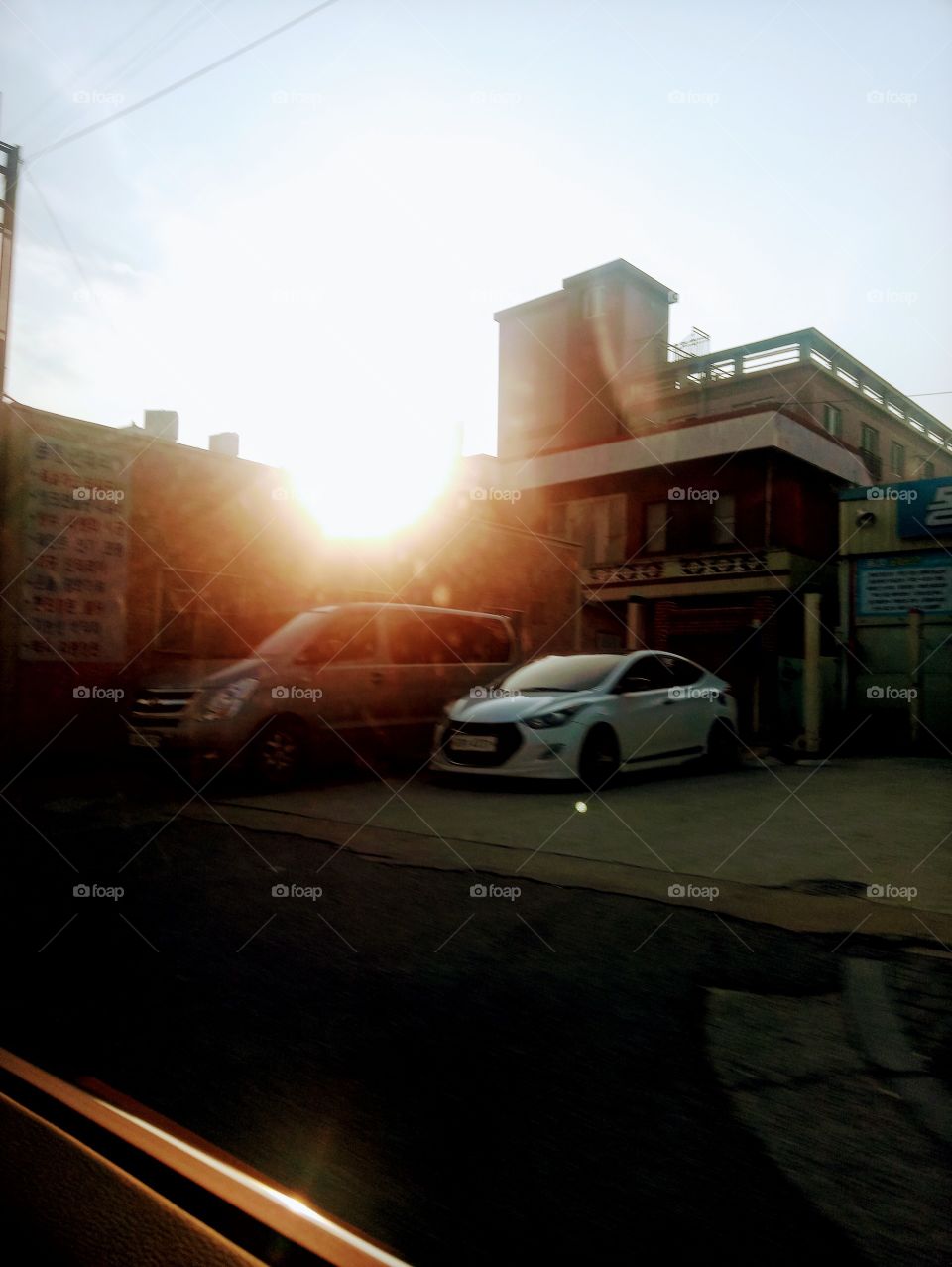 The sunset sunlight covers the part of the wall because of it's bright lights in Yangsan City,  South Korea.
