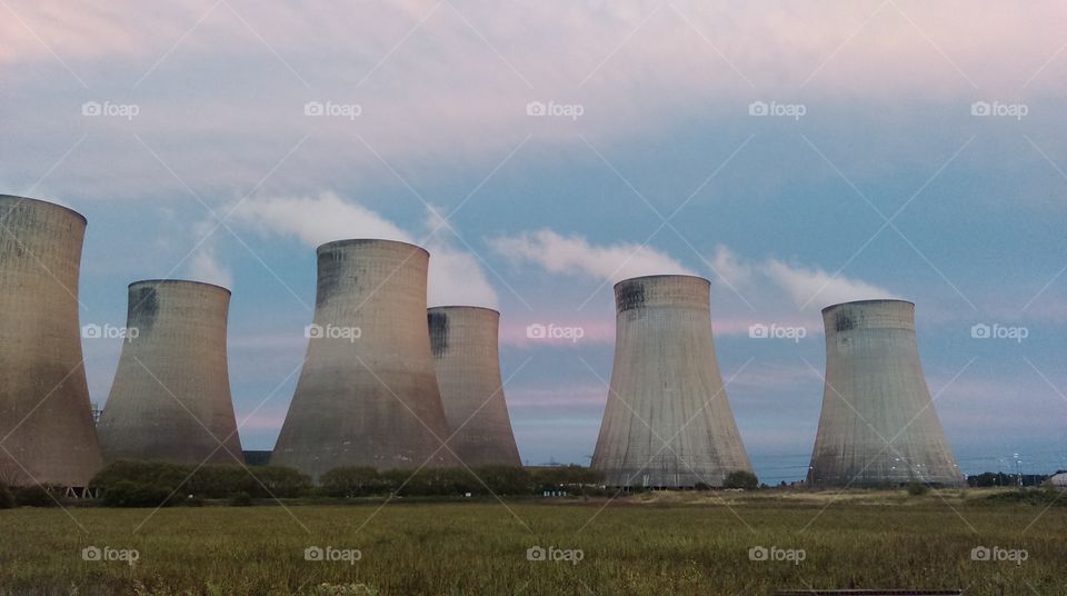 cooling towers at sunset