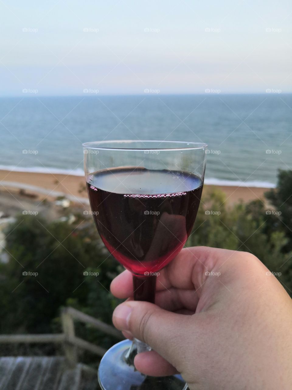 Glass of wine at the seafront