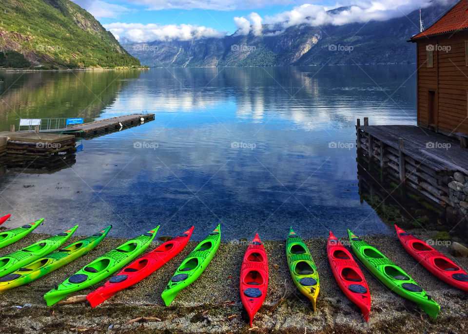 Kayaks beside a fjord in Norway 