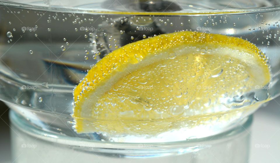 water with lemon 🍋 abstract background