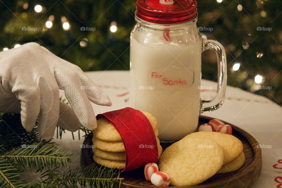 Santa stealing a cookie