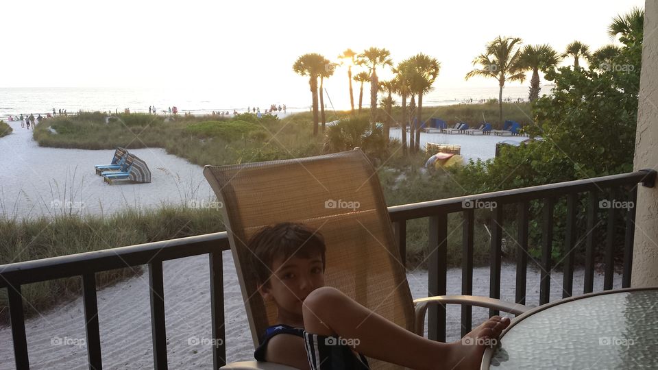 chair on the balcony. beach living in siesta