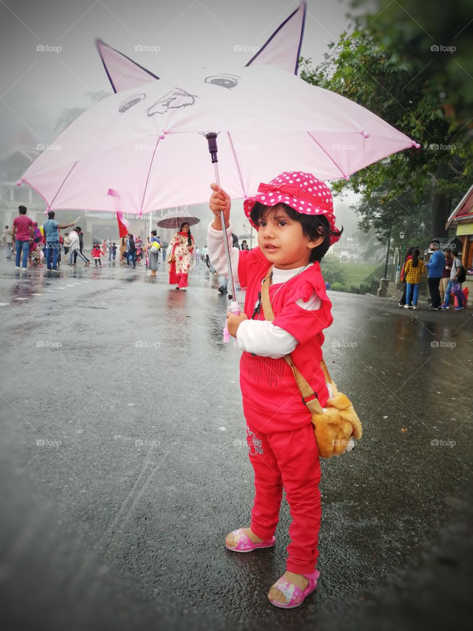 Cute smiling face in rainy day.