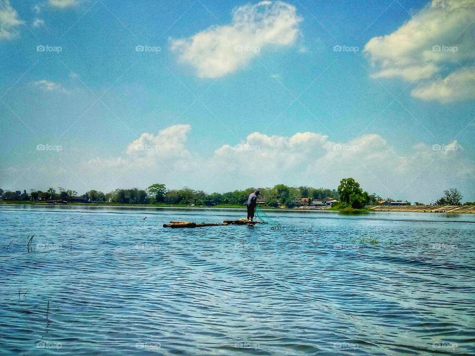 the fisherman in the lake