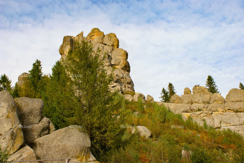 Rock massif among the forest